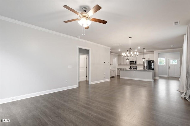 212 Sea Trail St, Hillsborough, NC 27278 - unfurnished living room with ceiling fan, ornamental molding, a chandelier, dark wood-style floors, and recessed lighting