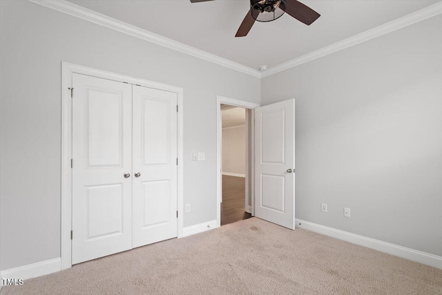 212 Sea Trail St, Hillsborough, NC 27278 - unfurnished bedroom featuring crown molding, carpet flooring, a closet, and ceiling fan