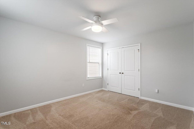 212 Sea Trail St, Hillsborough, NC 27278 - unfurnished bedroom featuring light carpet, a closet, and a ceiling fan
