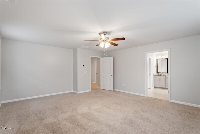 212 Sea Trail St, Hillsborough, NC 27278 - unfurnished bedroom with light carpet, ensuite bath, and a ceiling fan