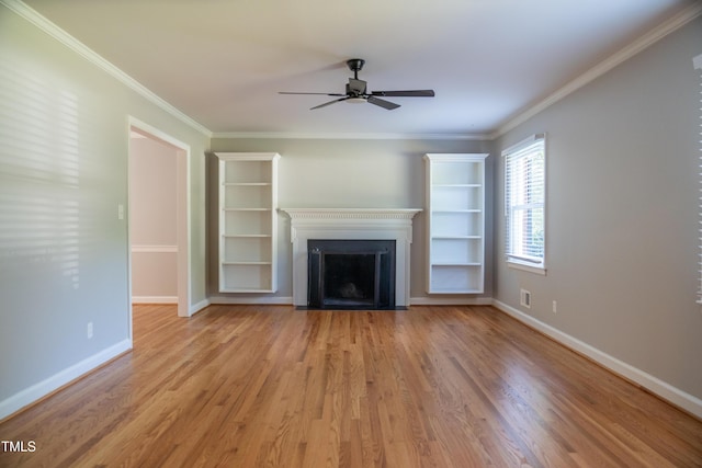 4813 Glen Forest Dr, Raleigh, NC 27612 - unfurnished living room with ceiling fan, a fireplace with flush hearth, light wood finished floors, ornamental molding, and baseboards