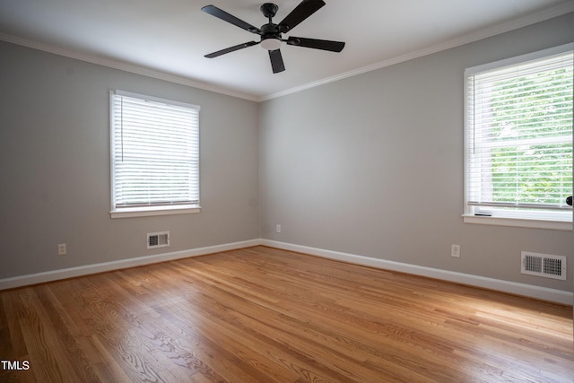 4813 Glen Forest Dr, Raleigh, NC 27612 - empty room with light wood-style floors, baseboards, crown molding, and ceiling fan