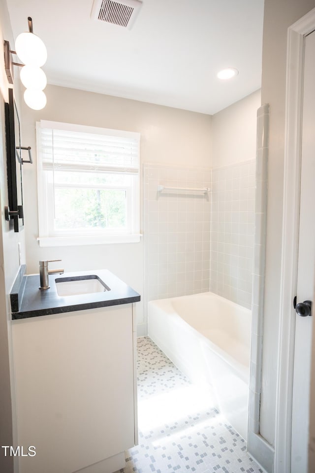 4813 Glen Forest Dr, Raleigh, NC 27612 - bathroom with a shower, recessed lighting, vanity, a bath, and tile patterned floors