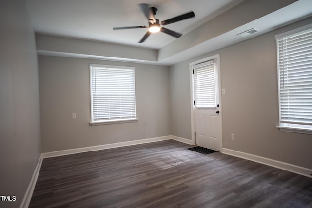 4813 Glen Forest Dr, Raleigh, NC 27612 - unfurnished room with ceiling fan, dark wood finished floors, and baseboards