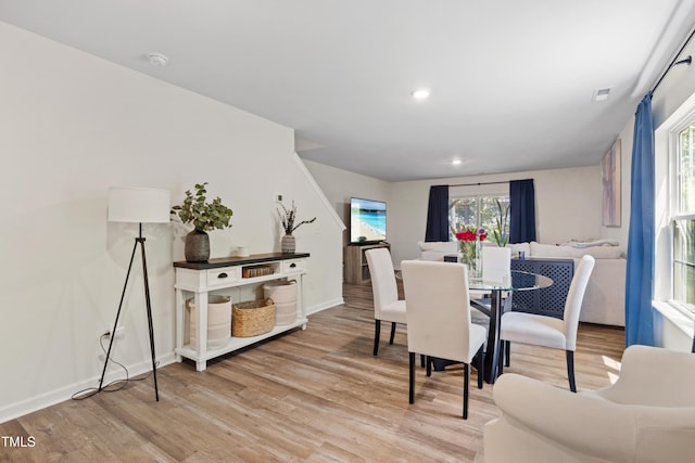 4157 Trevino Dr, Durham, NC 27704 - dining space featuring light wood finished floors, baseboards, and recessed lighting