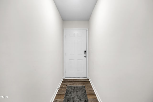 4157 Trevino Dr, Durham, NC 27704 - doorway to outside with dark wood-style floors and baseboards