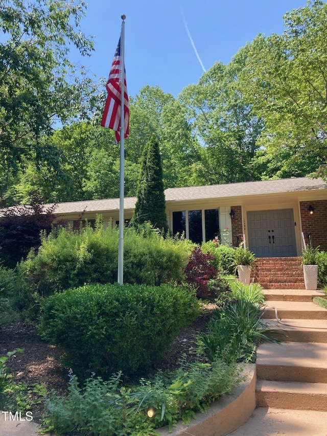 entrance to property with brick siding
