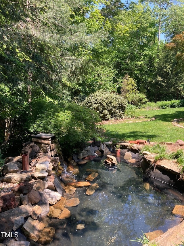 view of yard featuring a view of trees