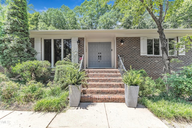10909 Raven Rock Dr, Raleigh, NC 27614 - property entrance with brick siding