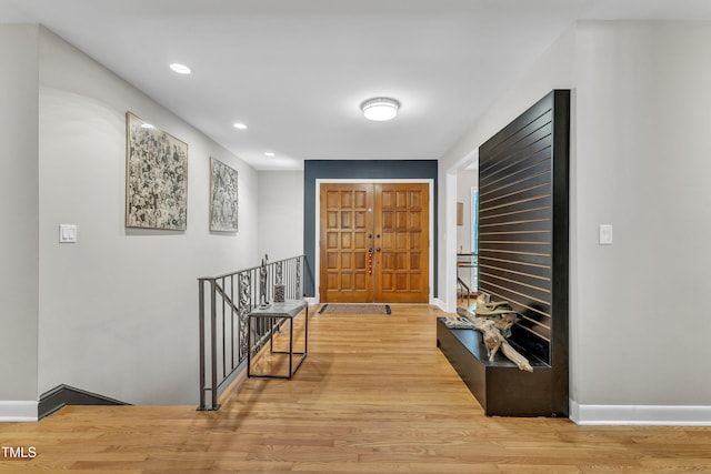10909 Raven Rock Dr, Raleigh, NC 27614 - entryway featuring baseboards, wood finished floors, and recessed lighting