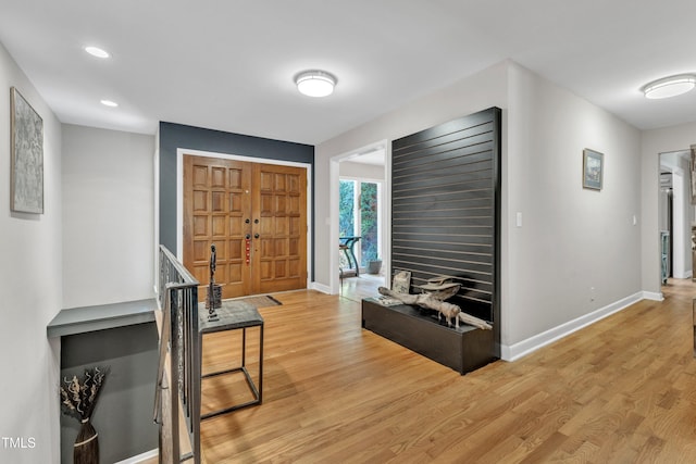 10909 Raven Rock Dr, Raleigh, NC 27614 - entrance foyer with light wood finished floors, baseboards, and recessed lighting
