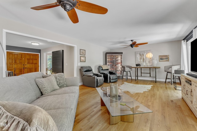 10909 Raven Rock Dr, Raleigh, NC 27614 - living area featuring a ceiling fan and light wood-style floors