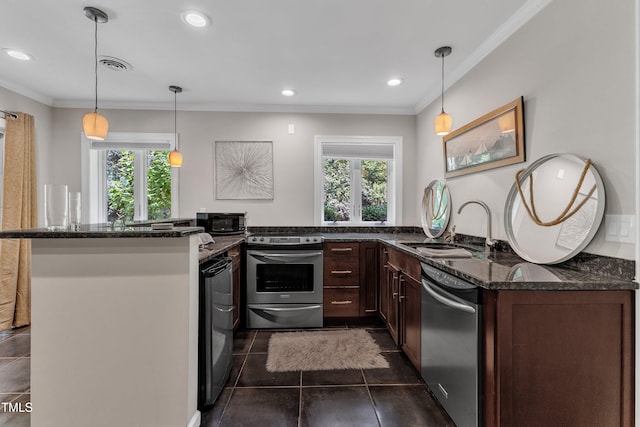 10909 Raven Rock Dr, Raleigh, NC 27614 - kitchen featuring appliances with stainless steel finishes, a sink, crown molding, dark tile patterned floors, and dark stone countertops
