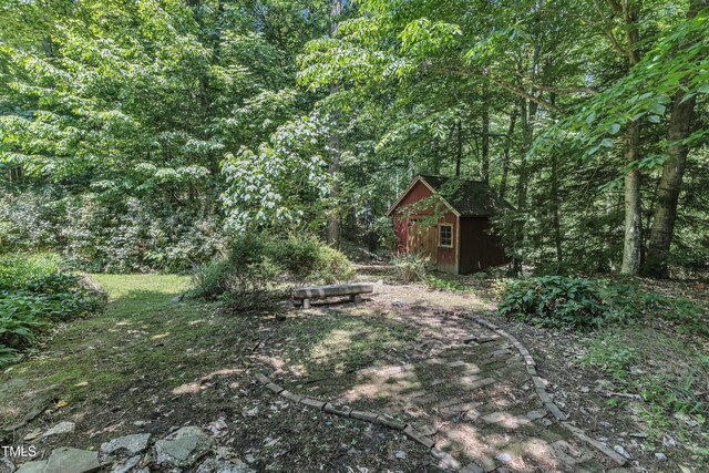 10909 Raven Rock Dr, Raleigh, NC 27614 - view of yard with a forest view