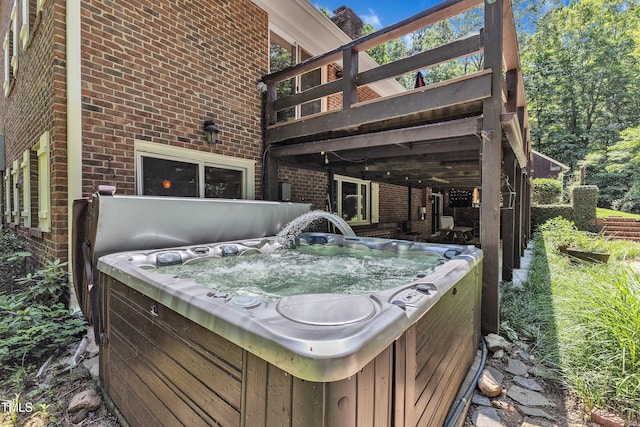 10909 Raven Rock Dr, Raleigh, NC 27614 - view of patio / terrace featuring a hot tub and a deck