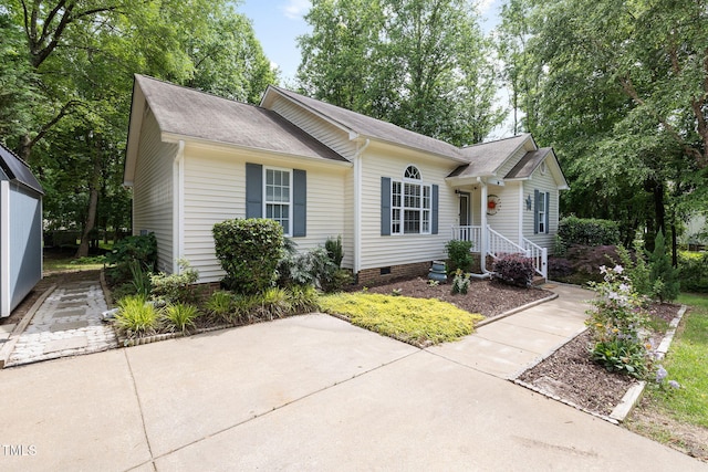 687 W Watson Rd, Benson, NC 27504 - view of front of property with crawl space and roof with shingles