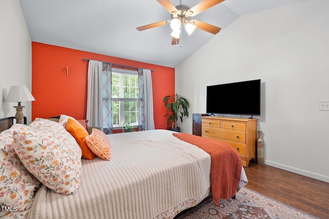 687 W Watson Rd, Benson, NC 27504 - bedroom with lofted ceiling, wood finished floors, baseboards, and a ceiling fan