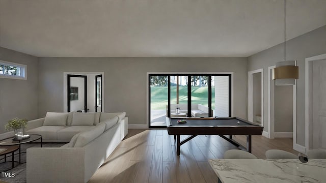 913 Tyrrell Rd, Raleigh, NC 27609 - rec room with baseboards and light wood-style floors