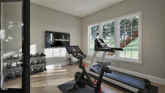 913 Tyrrell Rd, Raleigh, NC 27609 - workout area featuring plenty of natural light, baseboards, and wood finished floors