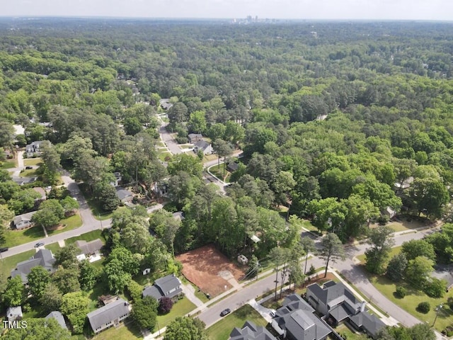 913 Tyrrell Rd, Raleigh, NC 27609 - aerial perspective of suburban area with a heavily wooded area