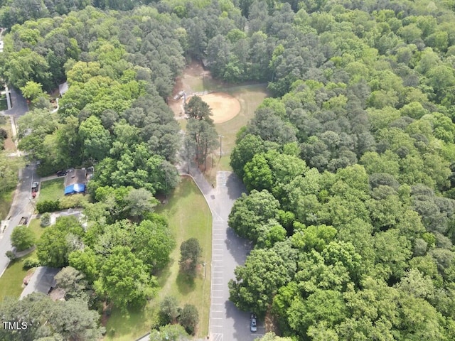 913 Tyrrell Rd, Raleigh, NC 27609 - aerial overview of property's location with a forest