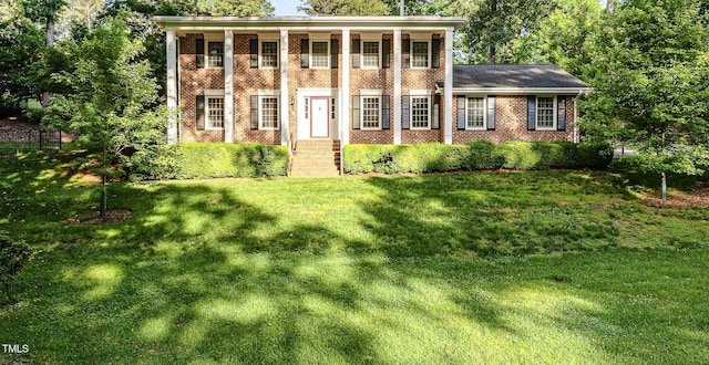 5513 Parkwood Dr, Raleigh, NC 27612 - neoclassical / greek revival house featuring brick siding