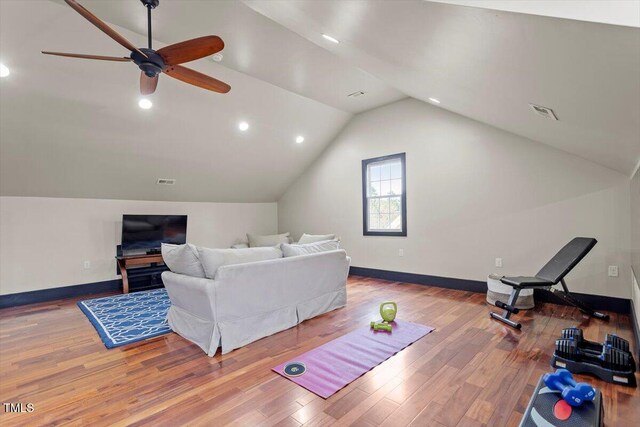 living area featuring a ceiling fan, wood finished floors, lofted ceiling, recessed lighting, and baseboards