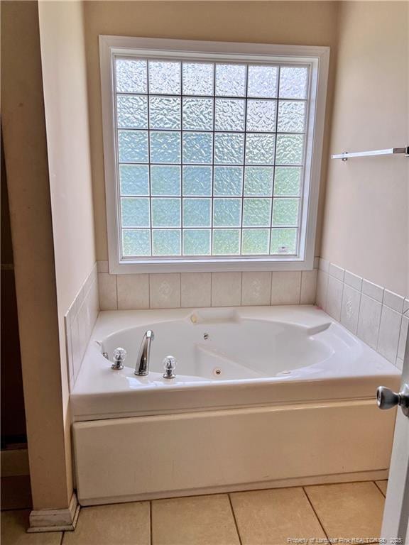 429 Bristlecone Rd, Fayetteville, NC 28311 - full bathroom with a jetted tub and tile patterned floors