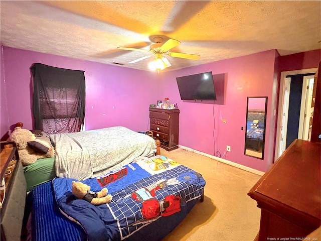 429 Bristlecone Rd, Fayetteville, NC 28311 - bedroom featuring carpet floors, a textured ceiling, a ceiling fan, and baseboards