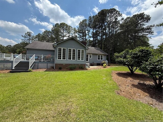 73 Night Heron Ct, Sanford, NC 27332 - back of house with a deck, crawl space, and a yard
