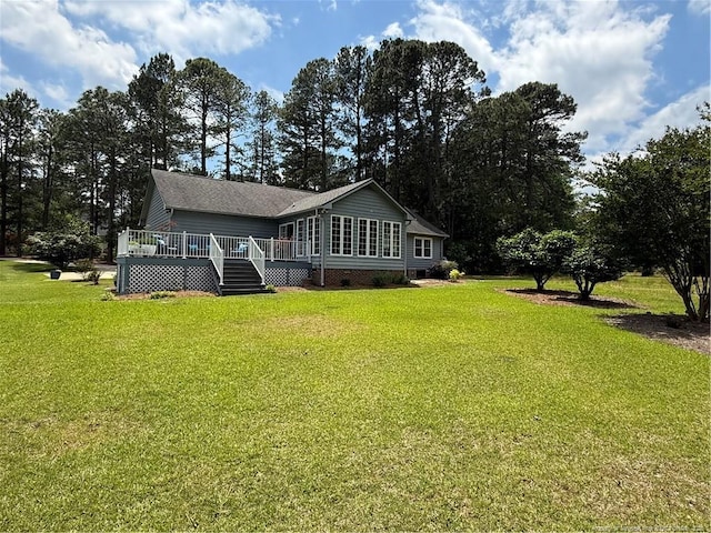73 Night Heron Ct, Sanford, NC 27332 - back of house with crawl space, a wooden deck, a yard, and a shingled roof