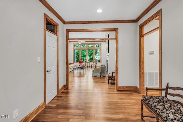 289 Stoneview, Pittsboro, NC 27312 - hall featuring crown molding, baseboards, light wood-style floors, and recessed lighting