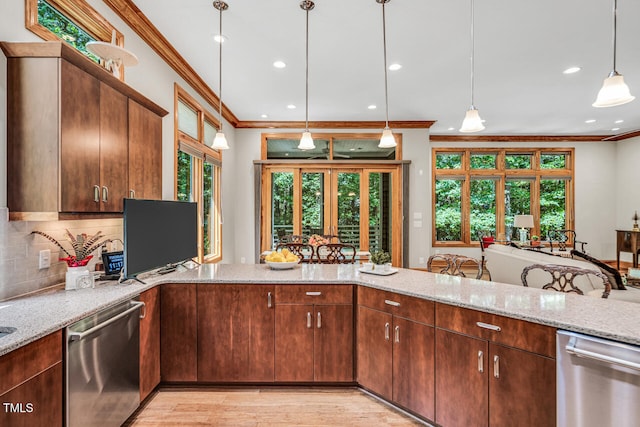 289 Stoneview, Pittsboro, NC 27312 - kitchen featuring dishwasher, ornamental molding, plenty of natural light, light stone counters, and recessed lighting