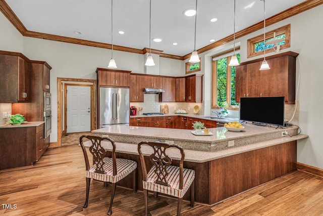 289 Stoneview, Pittsboro, NC 27312 - kitchen with high quality fridge, ornamental molding, oven, a peninsula, and backsplash
