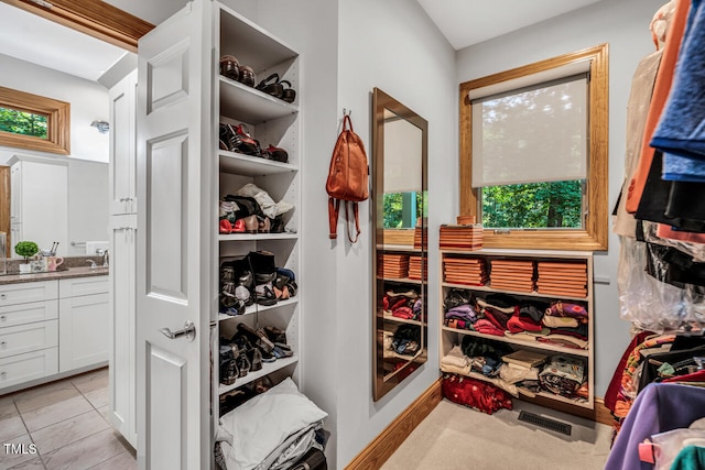 289 Stoneview, Pittsboro, NC 27312 - spacious closet featuring light tile patterned floors