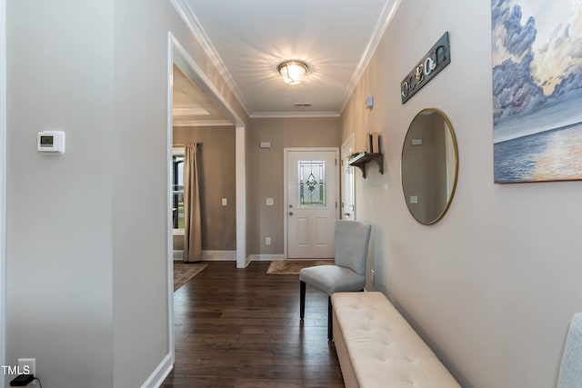 doorway to outside with crown molding, dark wood-type flooring, and baseboards