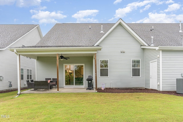 646 Shelford Trl, Zebulon, NC 27597 - back of property featuring a ceiling fan, a patio area, a lawn, and roof with shingles