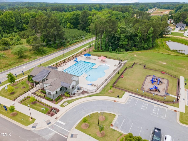 646 Shelford Trl, Zebulon, NC 27597 - drone / aerial view of a forest and a pool area