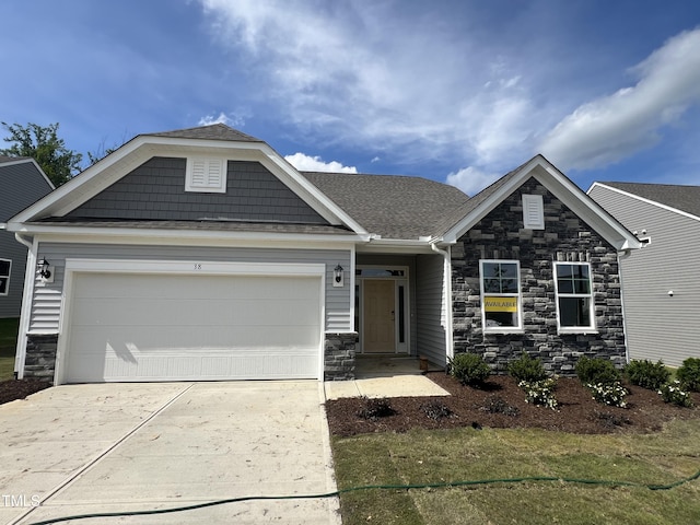 38 Gander Dr, Benson, NC 27504 - craftsman inspired home featuring stone siding, driveway, and a garage