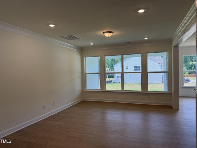 38 Gander Dr, Benson, NC 27504 - spare room with ornamental molding, baseboards, dark wood-style flooring, and recessed lighting