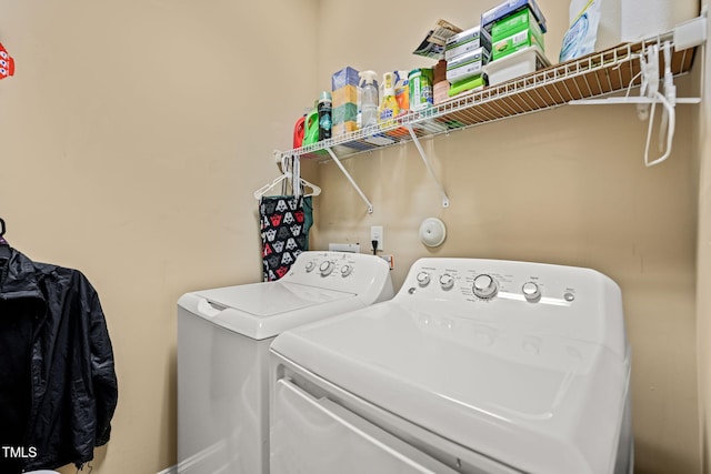 laundry area featuring washer and clothes dryer