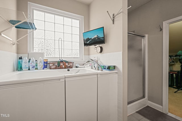 washroom featuring tile patterned flooring