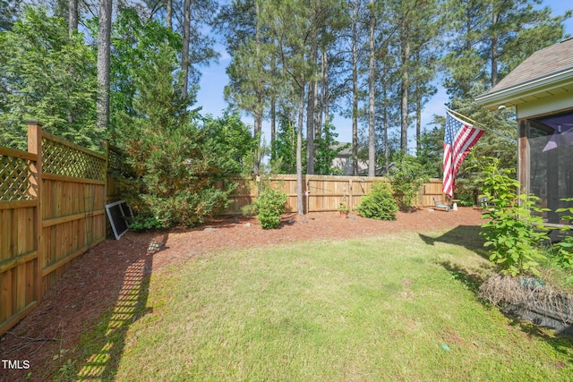 view of yard featuring a sunroom