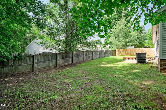 view of yard featuring central AC