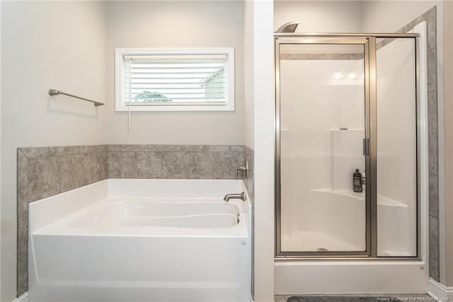 1409 Amen Ct, Hope Mills, NC 28348 - bathroom featuring a shower stall and a garden tub