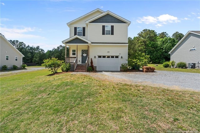 traditional-style house featuring gravel driveway, an attached garage, a front lawn, cooling unit, and covered porch