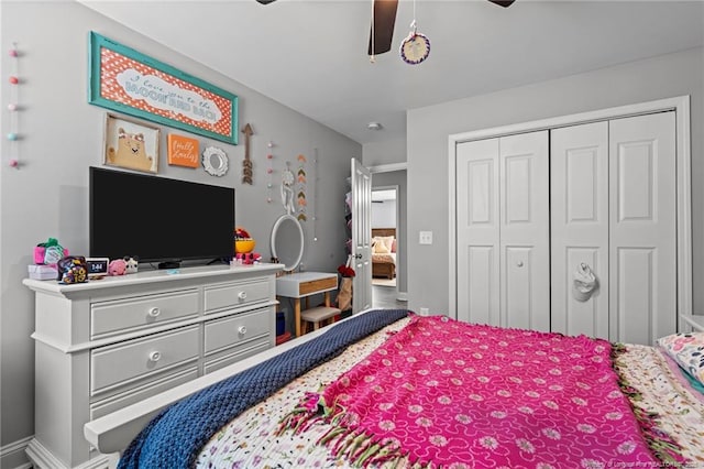 bedroom featuring a closet, a ceiling fan, and baseboards