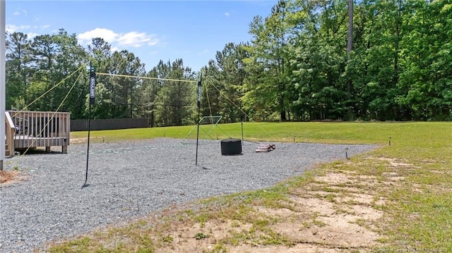 view of property's community featuring a yard
