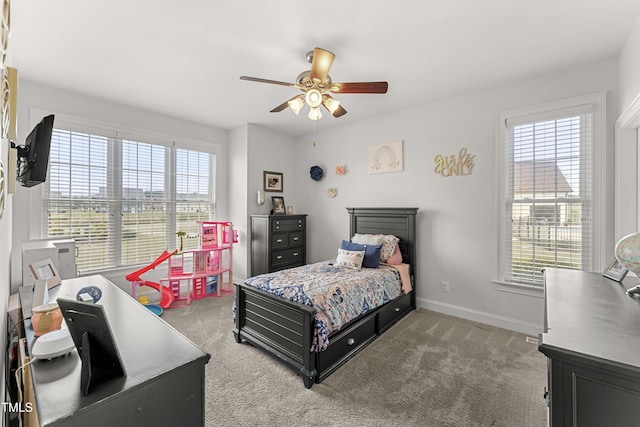 bedroom featuring carpet, baseboards, and ceiling fan