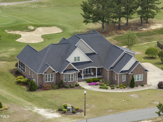 view of subject property featuring a golf club